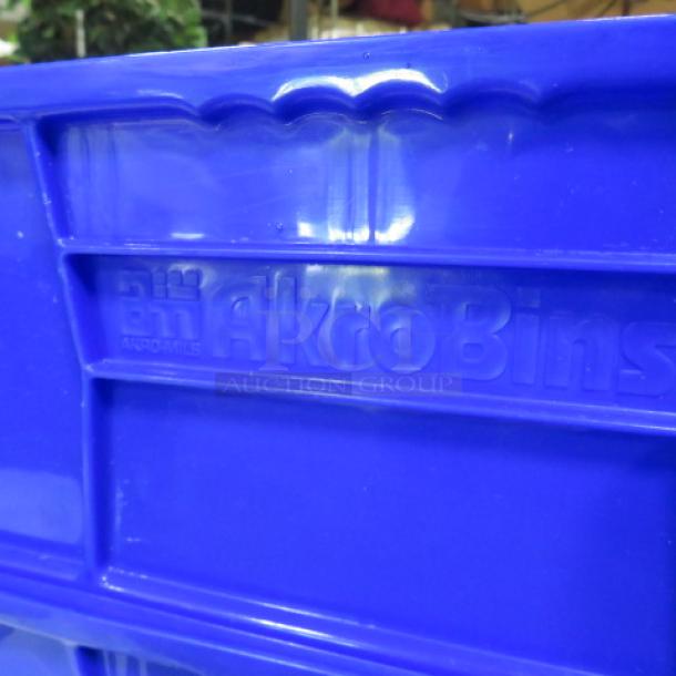 Blue Akro Bin 5XBID with embossed logo, sturdy plastic construction, ideal for storage and organization.