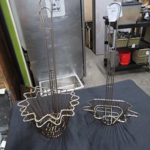 Assorted taco shell deep fry baskets, metal, set of two, with handles. Used condition, suitable for commercial kitchens.