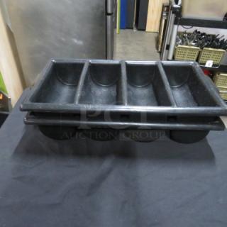 Black plastic flatware holder, 4 compartments, sturdy condition, used for organizing utensils, stackable design.