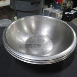 12-inch stainless steel mixing bowl, durable, with slight surface wear. Ideal for kitchen use. Model: 4XBID.