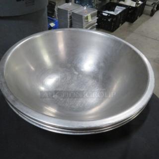 12-inch stainless steel mixing bowl in good condition, slightly polished finish, no visible dents or scratches.
