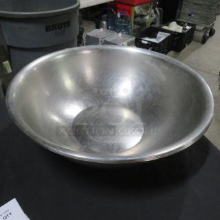 18-inch stainless steel mixing bowl with brushed finish, minor surface scratches, marked "3XBID," excellent for kitchen use.