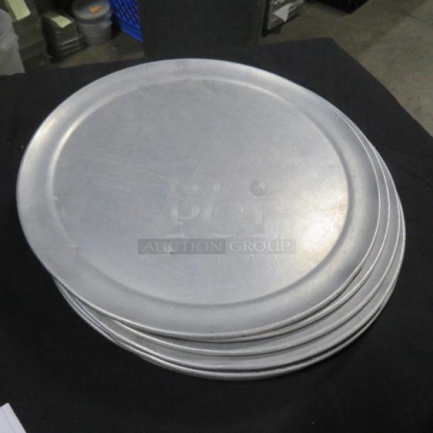 12-inch pizza pan stack, aluminum, moderate wear, suitable for baking, model 10XBID. Ideal for commercial use.