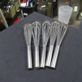 Set of four stainless steel whisks, model 5XBID, in used condition, perfect for kitchen mixing tasks.