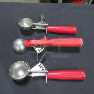 Three red handle dishers with stainless steel scoops, 3XBID model. Used condition, minor wear visible on metal parts.