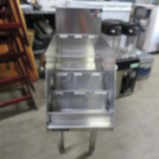 Perlick stainless steel 5-tier bottle display, dimensions 12x24x35.5 inches, durable condition, retail $1137.95.