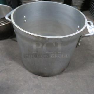 20 Quart aluminum stock pot, used condition, featuring sturdy riveted handles.