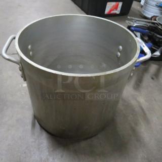 20 Quart aluminum stock pot with dual handles; used condition, ideal for large batch cooking.