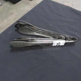 Assorted stainless steel tongs, set of five, perforated design, gently used. Auction tag reads "25" for lot identification.