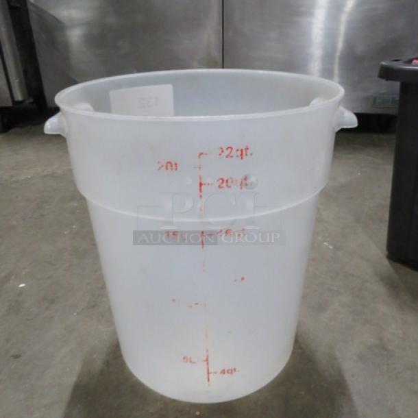 Clear round 22-quart food storage container, marked in red increments, handles on sides, in good condition.