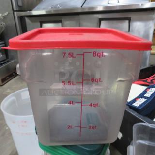 8-quart food storage container with lid, red top, marked with measurements from 2 to 8 quarts, clear plastic, good condition.