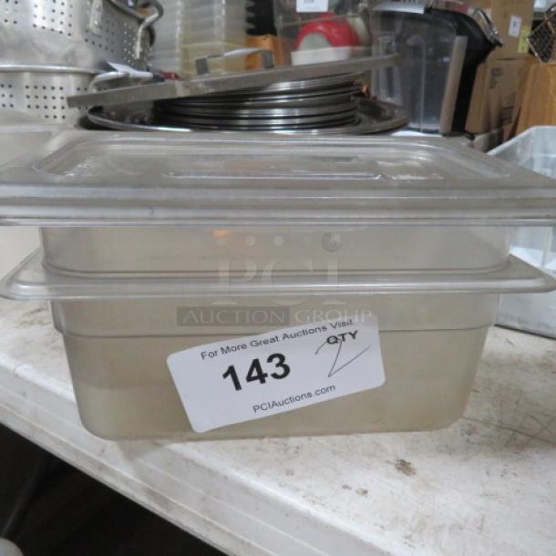 1/4 size 4-inch deep food storage container with lid, clear plastic, auction label with number 143, PCI Auctions branding.