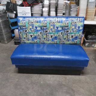 Single-sided booth with blue cushioned seat and patterned backrest, measuring 48x25x36 inches. Good condition.