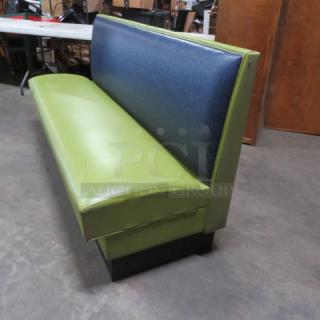 Single-sided booth with green cushioned seat and blue back, dimensions 72x25x36, in good condition.