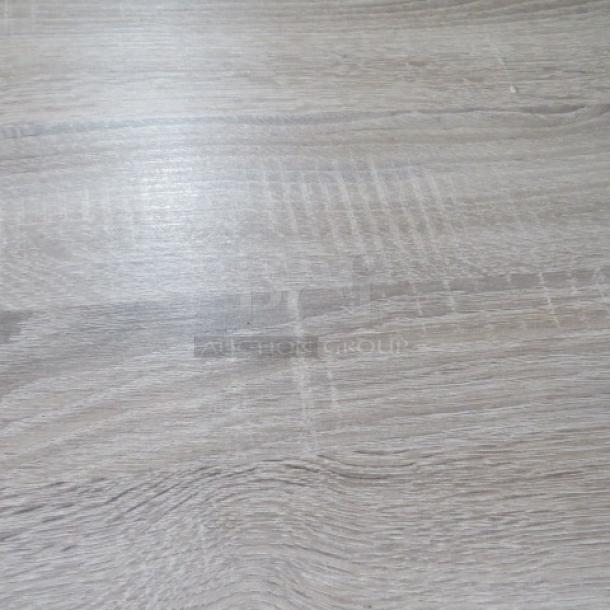 Brown tabletop with visible wood grain. Dual pedestal bases. Dimensions: 48x30x30 inches. Appears to be in good condition.
