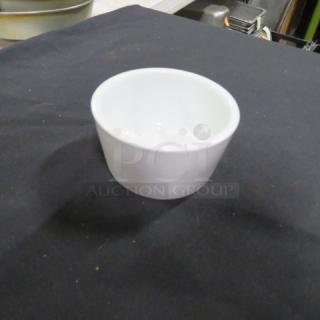 Lot of 25 CAC ramekins, 3.5x2 inches, white ceramic, new condition, ideal for serving desserts or sauces.