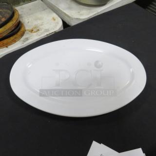 Lot of 25 Prolon Melamine Oval Platters, Model 9517, 13.5x9.5 inches, used, white, durable, high quality serving dishes.