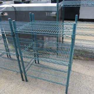 Metro green shelf with 3 wire shelves, 24x18x35 inches. Sturdy construction, ideal for storage. Slight wear visible.
