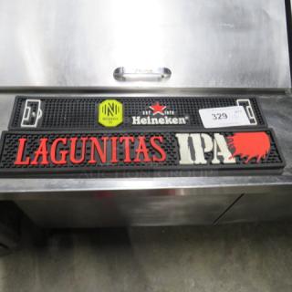Assorted bar mat featuring Lagunitas IPA, Heineken, and OND mezcal logos, black rubber, excellent condition.