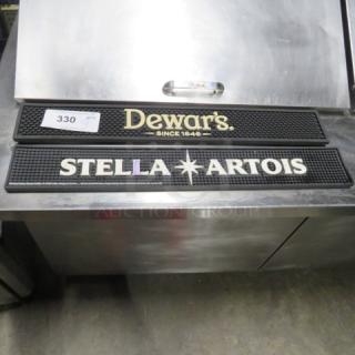Assorted bar mat featuring Dewar's and Stella Artois logos. Item marked 4XBID.