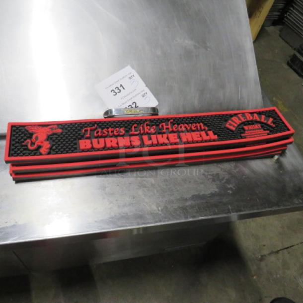 Fireball bar mat featuring red logo and slogan "Tastes Like Heaven, Burns Like Hell," in good condition.
