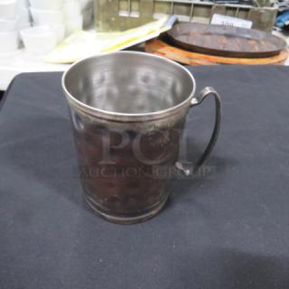 Aged copper Moscow Mule mug, model 9XBID, with hammered finish and sturdy handle, showing light tarnish.