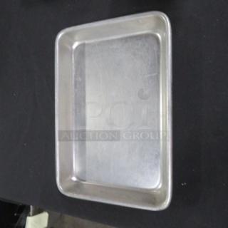 Aluminum sheet pan, 9.5x6.5 inches, lightly scratched, part of a lot of 50. Ideal for baking, good condition.