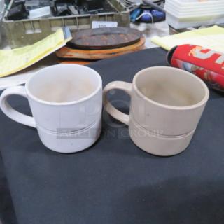 One Mega Lot of 36 coffee mugs: 31 brown and 5 white, assorted design, gently used condition.