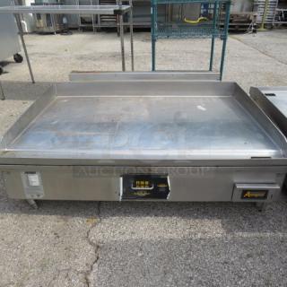 Accutemp natural gas flat top griddle, model GGF1201A4850. Dimensions 48.5x39x18.5 inches. Working condition.