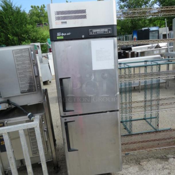 Turbo Air Dutch Door Refrigerator/Freezer, Model M3RF192-N, 25x32x77 inches, on casters, good condition, includes 2 racks.
