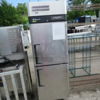 Turbo Air Dutch Door Refrigerator/Freezer, Model M3RF192-N, 25x32x77 inches, on casters, good condition, includes 2 racks.