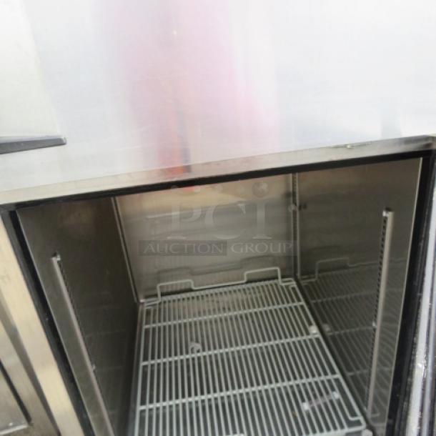 Turbo Air M3RF192-N Dutch Door Refrigerator/Freezer, 25x32x77, includes 2 racks, on casters, 115V, stainless steel interior.