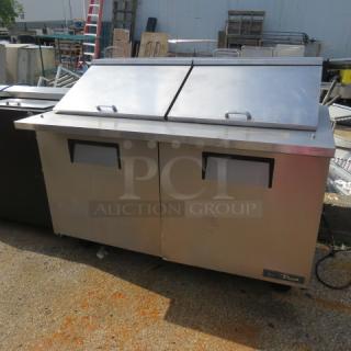 True 2-door refrigerated prep table, Model TSSU-60-24M-B-ST-HC, on casters, 60x34x48 inches, stainless steel, 115V.