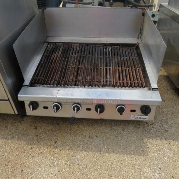 US Range natural gas charbroiler, 36x33x14 inches, stainless steel, working condition, featuring control knobs and grates.