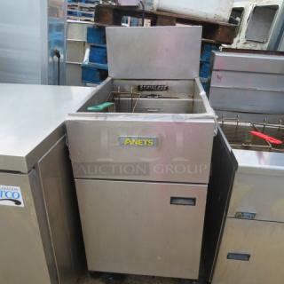 Anets SLG100 natural gas deep fryer with one basket on casters, stainless steel finish, dimensions 20x37x48 inches.