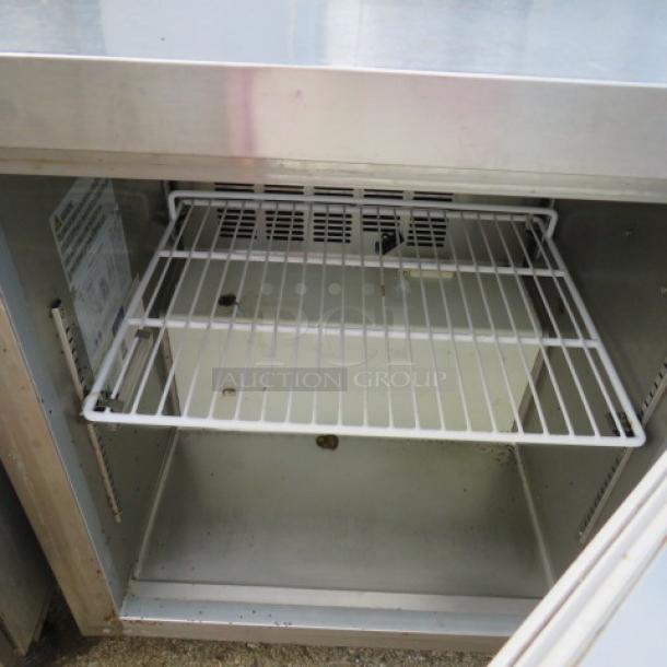 Avantco 1 Door Worktop Cooler with 1 Rack, Model 178AU27RHC. Measures 27x29.5x36 inches, on casters, 115 Volt, used.
