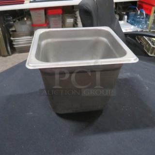 1/6 Size 6 Inch Deep Hotel Pan, stainless steel, gently used condition, ideal for catering and storage.