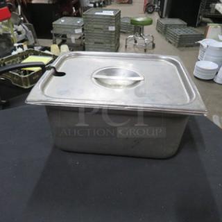 Half-size 6-inch deep hotel pan with lid, stainless steel, pre-owned, good condition, slight wear marks.