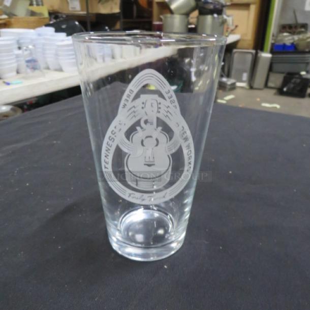Tennessee Brew Works beer glass with logo, in excellent condition. Clear glass, featuring etched brewery name and guitar design.