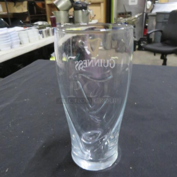 Guinness beer glass, clear with etched logo, excellent condition, 17XBID marking visible. Suitable for collectors.