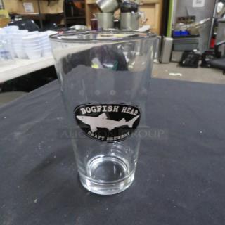 Dogfish Head craft beer glass, 14XBID, featuring the brewery logo, in good condition.
