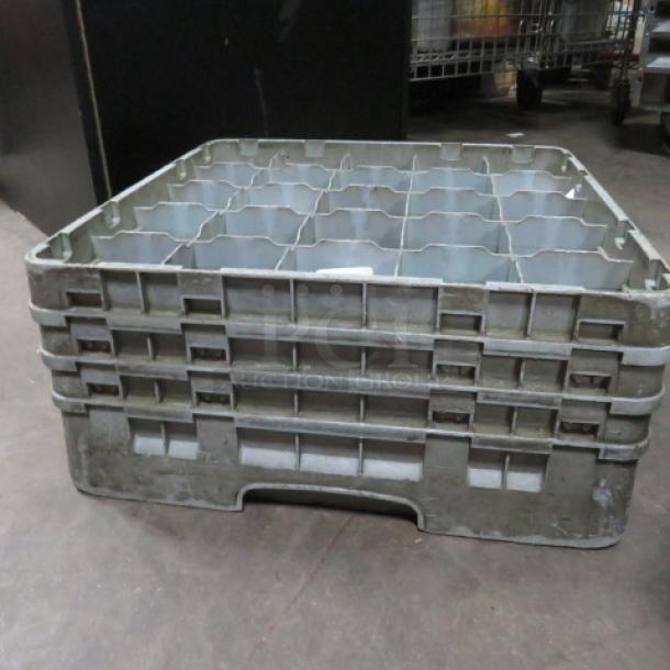 25-hole dishwasher rack, model 3XBID, in used condition. Gray plastic with sturdy construction for commercial use.