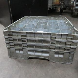 25-hole dishwasher rack, model 3XBID, in used condition. Gray plastic with sturdy construction for commercial use.