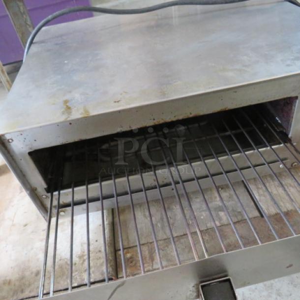 Fusion Pizza Oven, Model 508, 120V, 1450W, 18x16x8 inches. Used condition with visible wear, open front view showing wire rack.