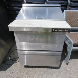 Continental SW27-12M refrigerated prep table, 2 drawers, on casters, 28x34x42 inches, stainless steel, 115V, visible branding.