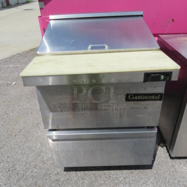 Continental 2 Drawer Refrigerated Prep Table, Model SW27-12M, on casters. Stainless steel, 28x34x42, 115V.