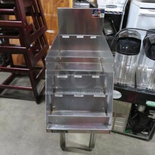 Perlick stainless steel 5-tier bottle display, 12x24x35.5 inches, excellent condition, durable and sleek design.