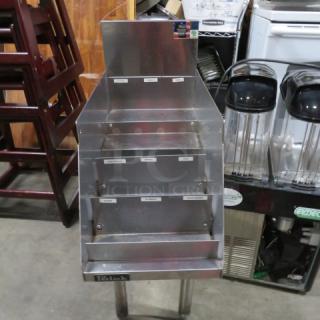 Perlick stainless steel 5-tier bottle display, 12x24x35.5 inches. Features labels for organization. Excellent condition.