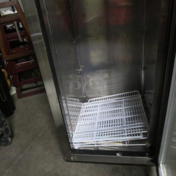 Everest ESGR1 glass door display cooler with four racks, on casters, 115 Volt, excellent condition.