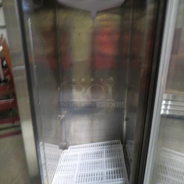 Everest ESGR1 Glass Door Display Cooler with 4 racks, on casters, 115V. Excellent condition, spacious interior.